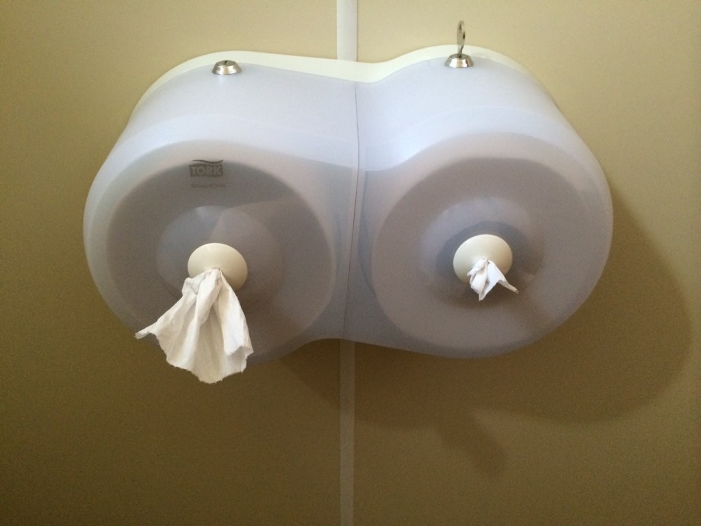 Very boob-like toilet paper dispenser